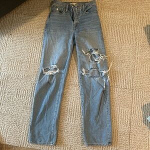 Distressed Blue Jeans